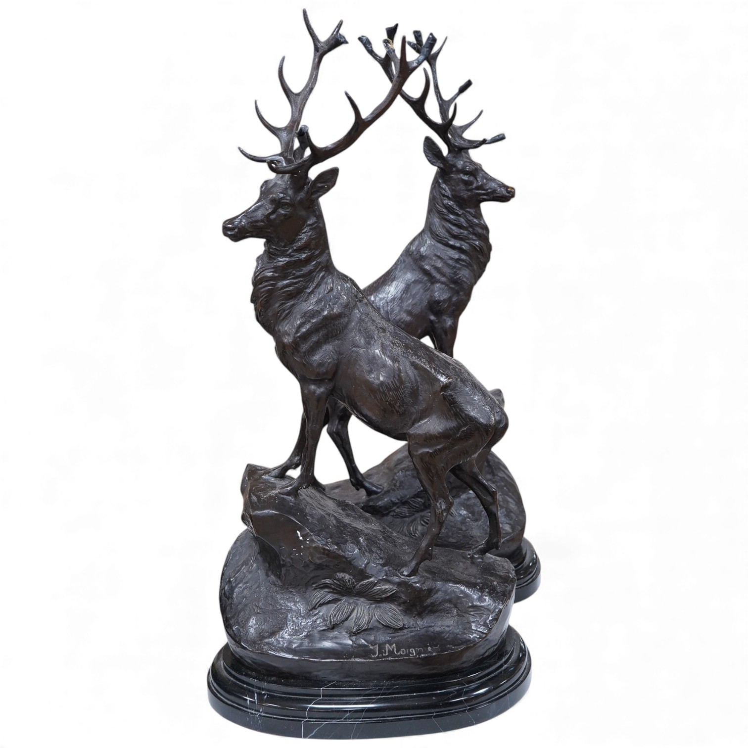 After Jules Moigniez (French, 1835-1894), a pair of anamalier bronze figures of stags, signed, 73cm high